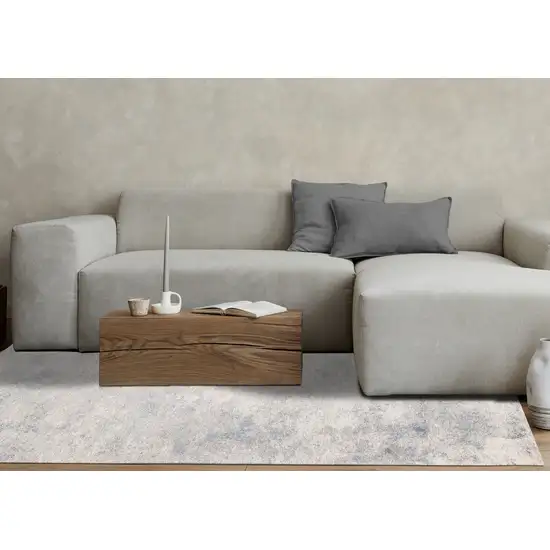 Cream And Blue Abstract Area Rug Photo 6