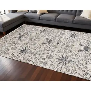 Photo of Cream And Blue Floral Medallion Area Rug