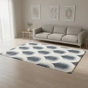 Photo of Cream And Blue Geometric Area Rug