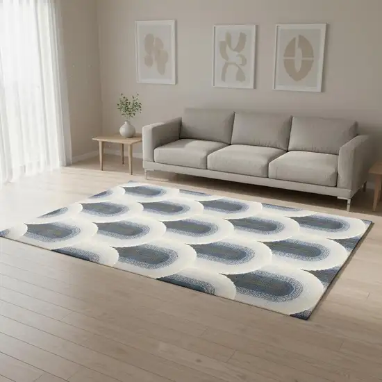 Cream And Blue Geometric Area Rug Photo 1