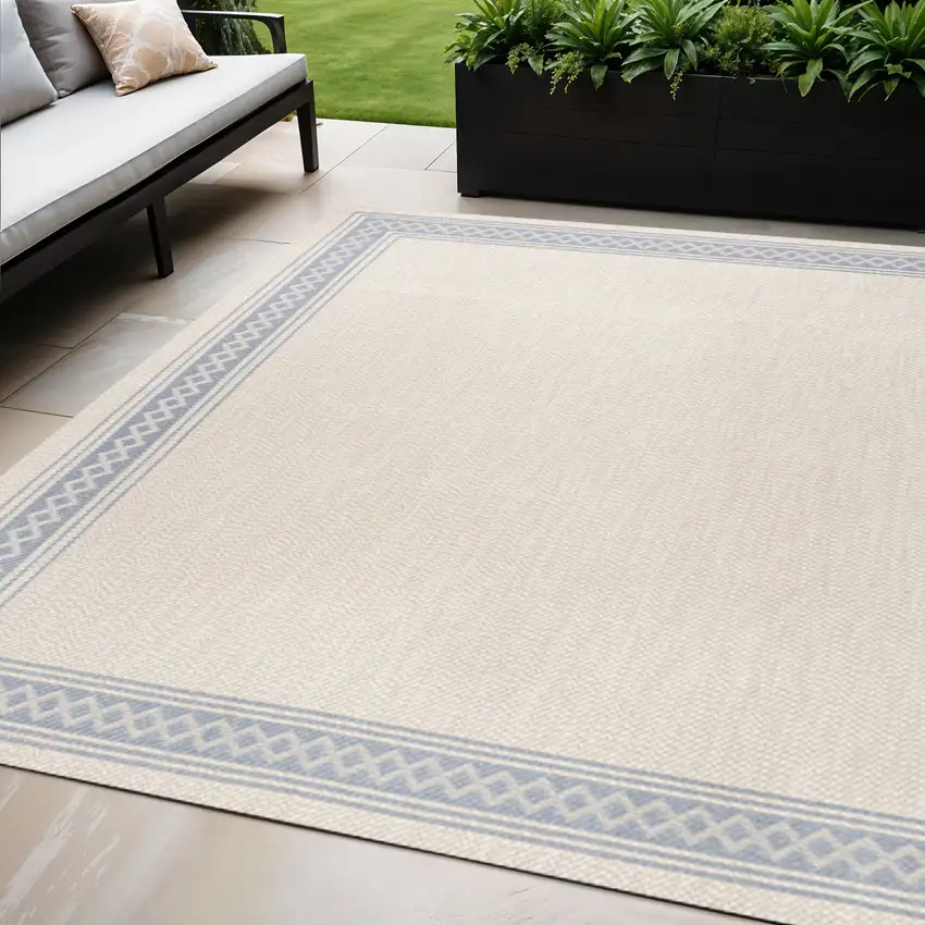 Cream And Blue Indoor Outdoor Area Rug Photo 1