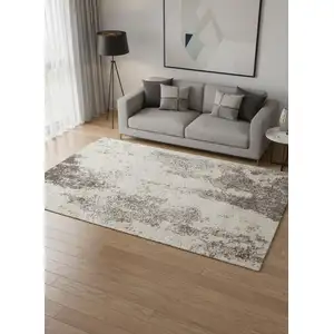 Photo of Cream And Brown Abstract Area Rug