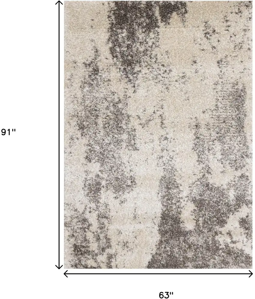 Cream And Brown Abstract Area Rug Photo 3