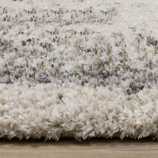 Cream And Brown Abstract Area Rug Photo 9
