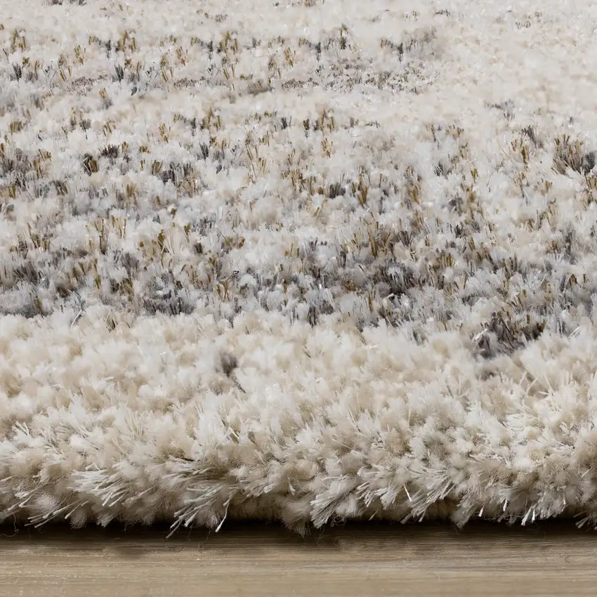 Cream And Brown Abstract Area Rug Photo 9
