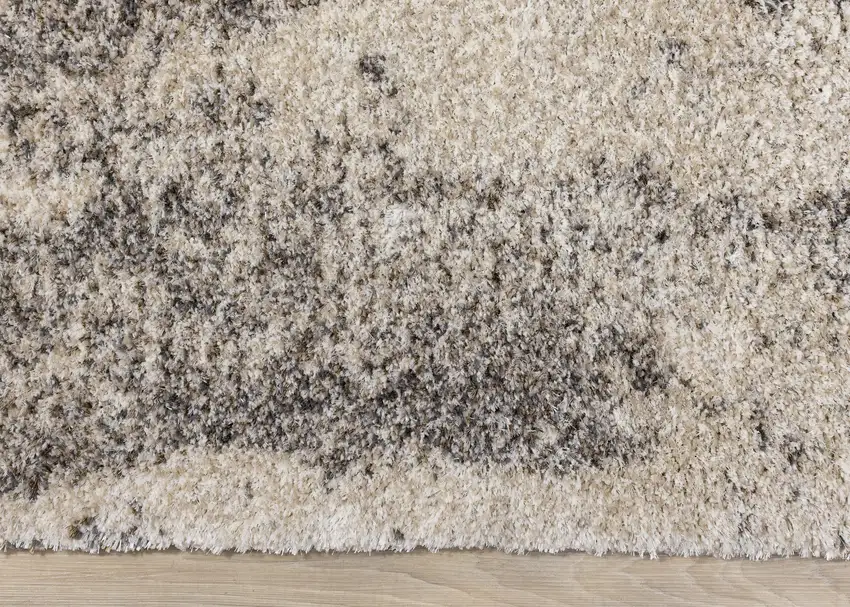 Cream And Brown Abstract Area Rug Photo 8