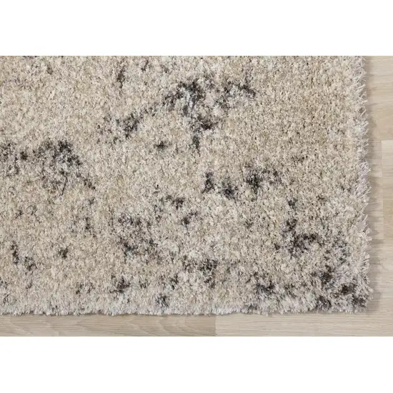 Cream And Brown Abstract Area Rug Photo 8
