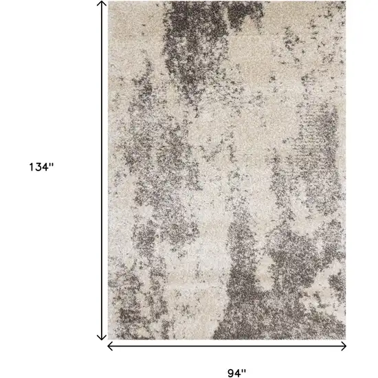 Cream And Brown Abstract Area Rug Photo 3