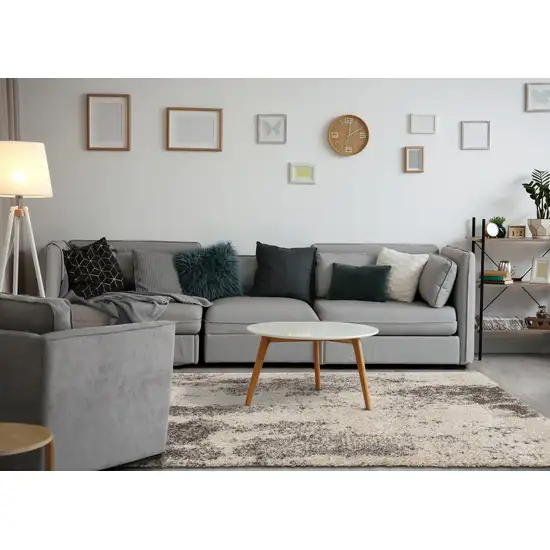 Cream And Brown Abstract Area Rug Photo 6