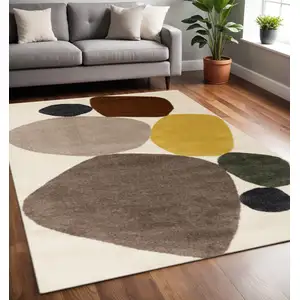 Photo of Cream And Brown Geometric Area Rug