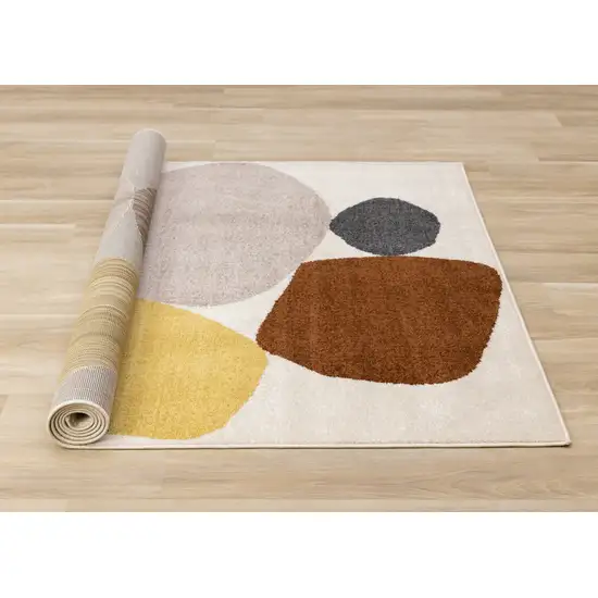 Cream And Brown Geometric Area Rug Photo 9