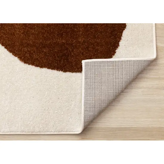 Cream And Brown Geometric Area Rug Photo 9