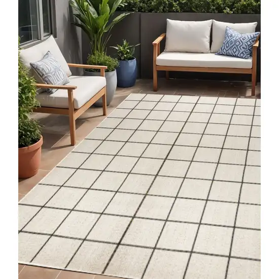 Cream And Dark Gray Plaid Indoor Outdoor Area Rug Photo 1
