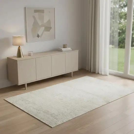 Cream And Gold Abstract Area Rug Photo 2