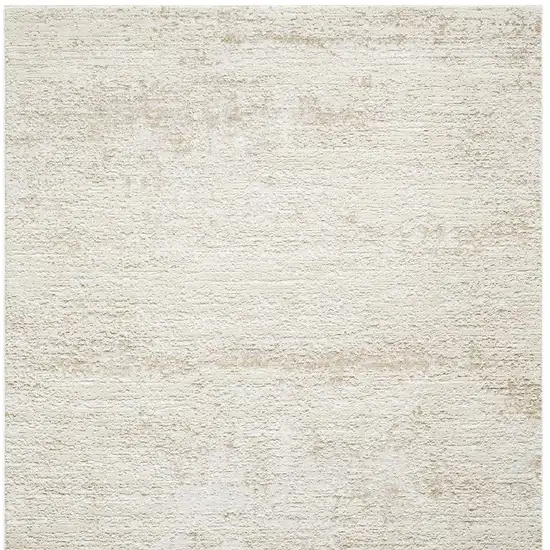 Cream And Gold Abstract Area Rug Photo 8