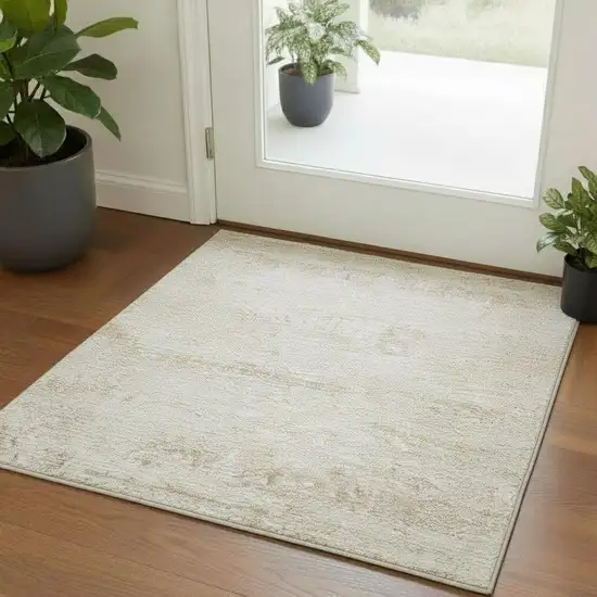 Cream And Gold Abstract Square Rug Photo 1