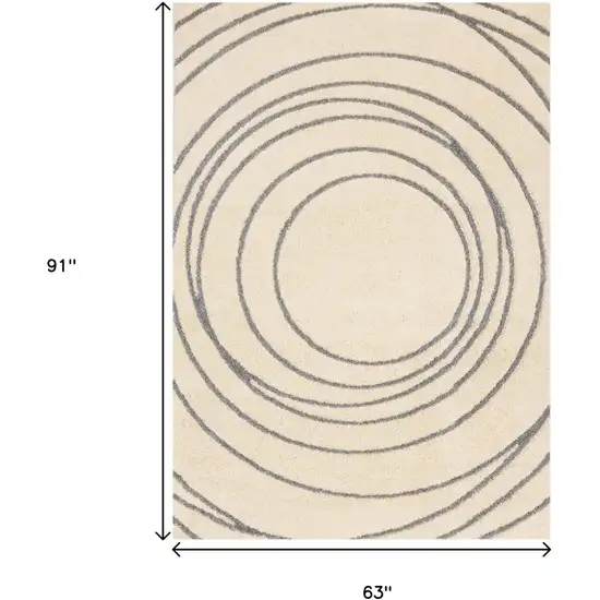 Cream And Gray Abstract Area Rug Photo 3