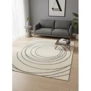 Photo of Cream And Gray Abstract Area Rug