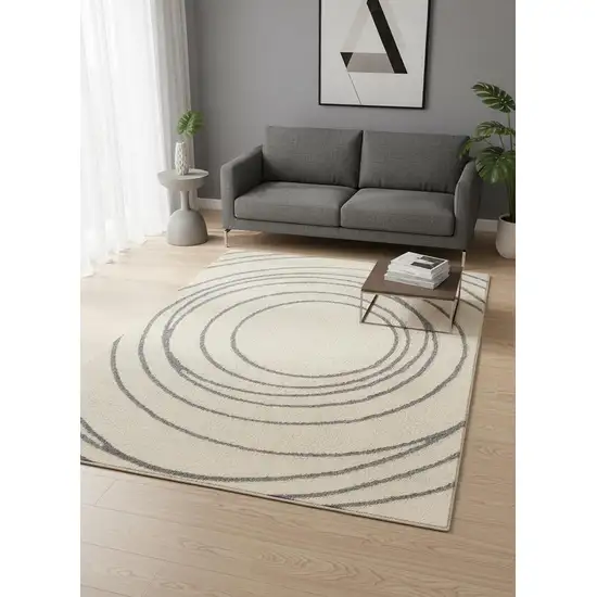 Cream And Gray Abstract Area Rug Photo 1