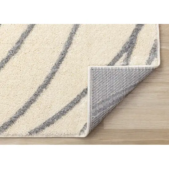 Cream And Gray Abstract Area Rug Photo 9