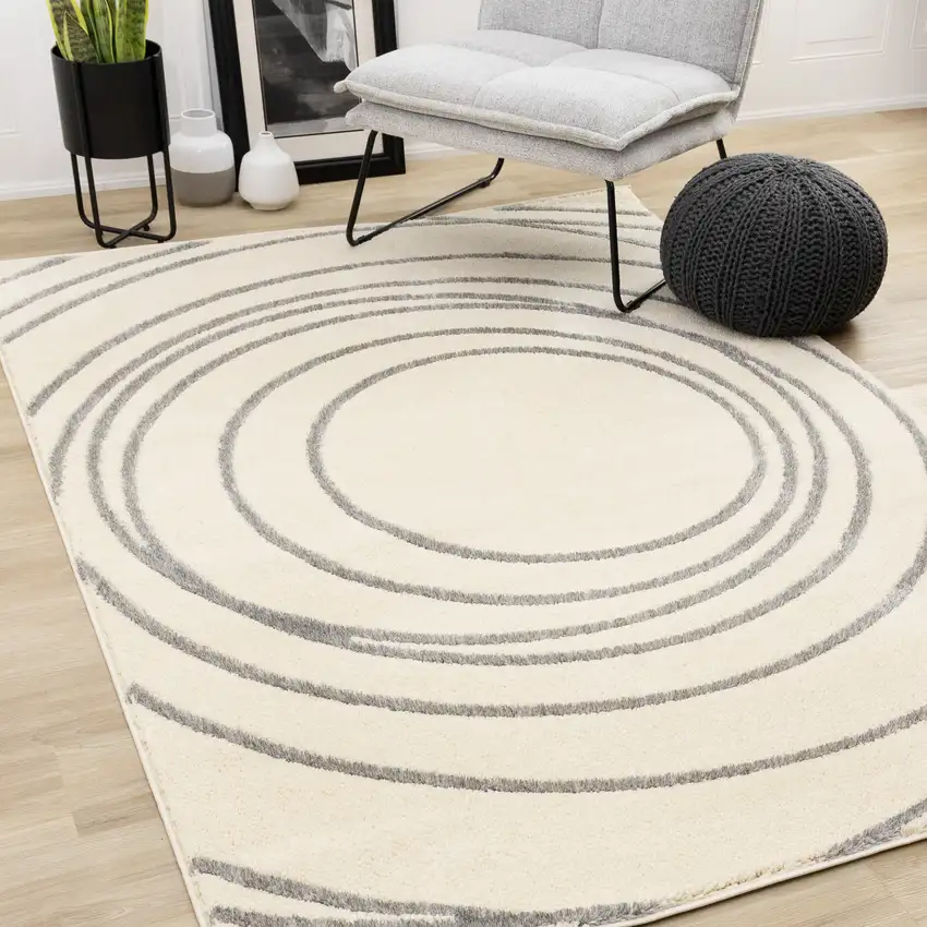 Cream And Gray Abstract Area Rug Photo 6