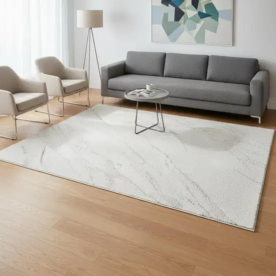 Cream And Gray Abstract Area Rug Photo 1