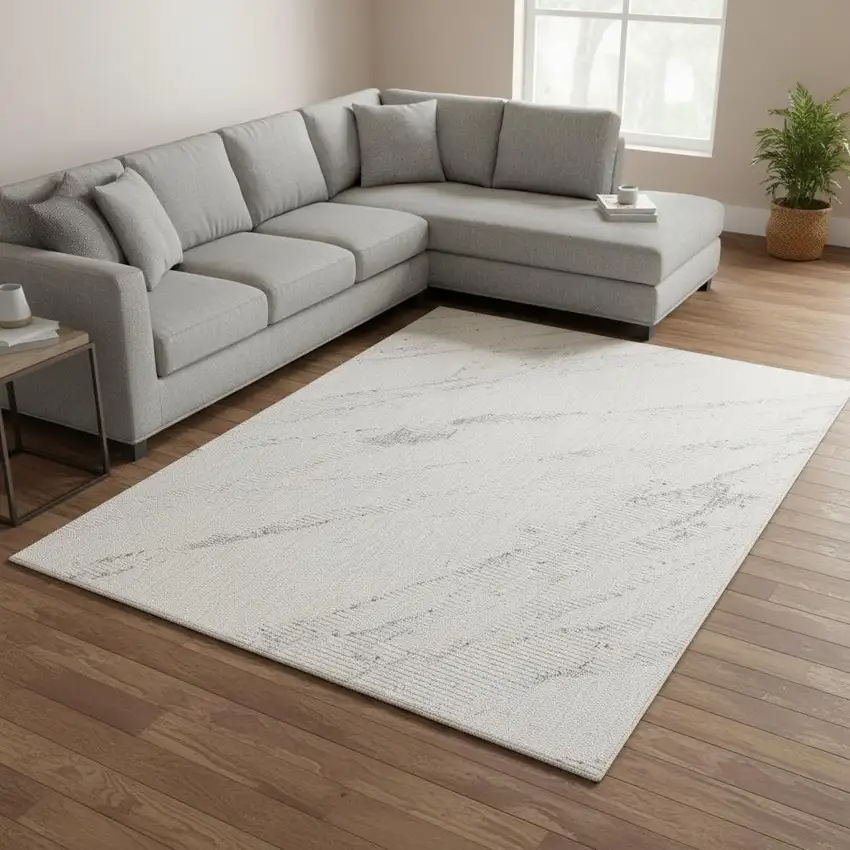 Cream And Gray Abstract Area Rug Photo 1