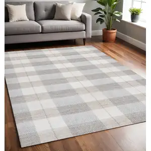 Photo of Cream And Gray Geometric Hand Woven Area Rug