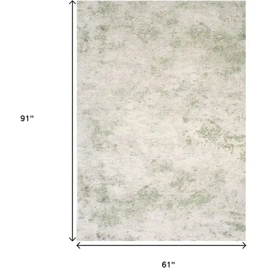 Cream And Green Abstract Area Rug Photo 3