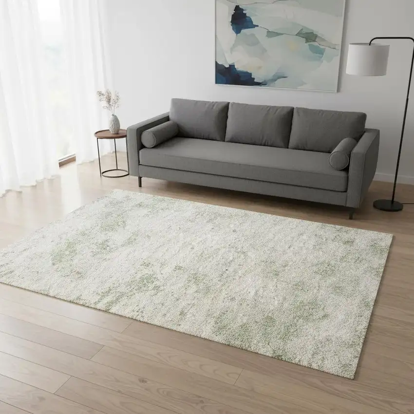 Cream And Green Abstract Area Rug Photo 1