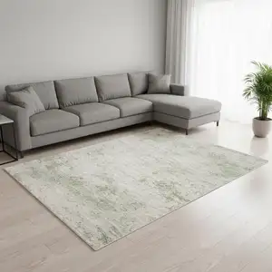 Photo of Cream And Green Abstract Area Rug
