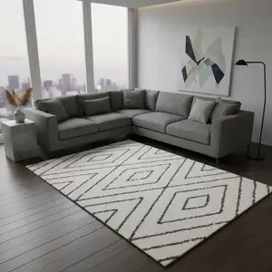 Photo of Cream And Green Geometric Area Rug