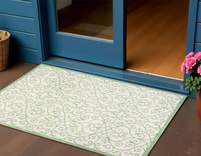 Cream And Green Geometric Indoor Outdoor Area Rug Photo 1