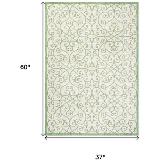 Cream And Green Geometric Indoor Outdoor Area Rug Photo 5
