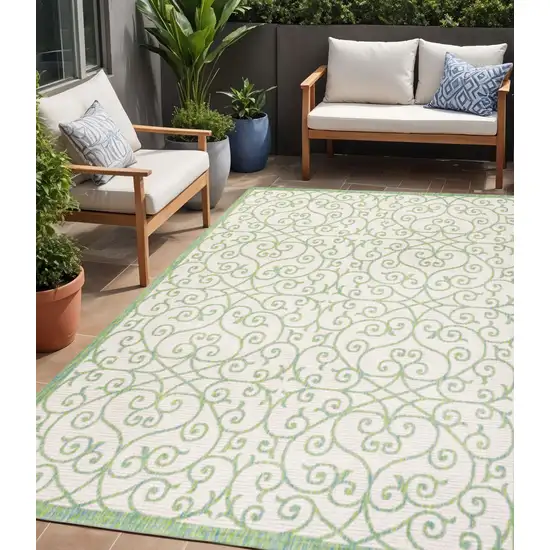 Cream And Green Geometric Indoor Outdoor Area Rug Photo 1