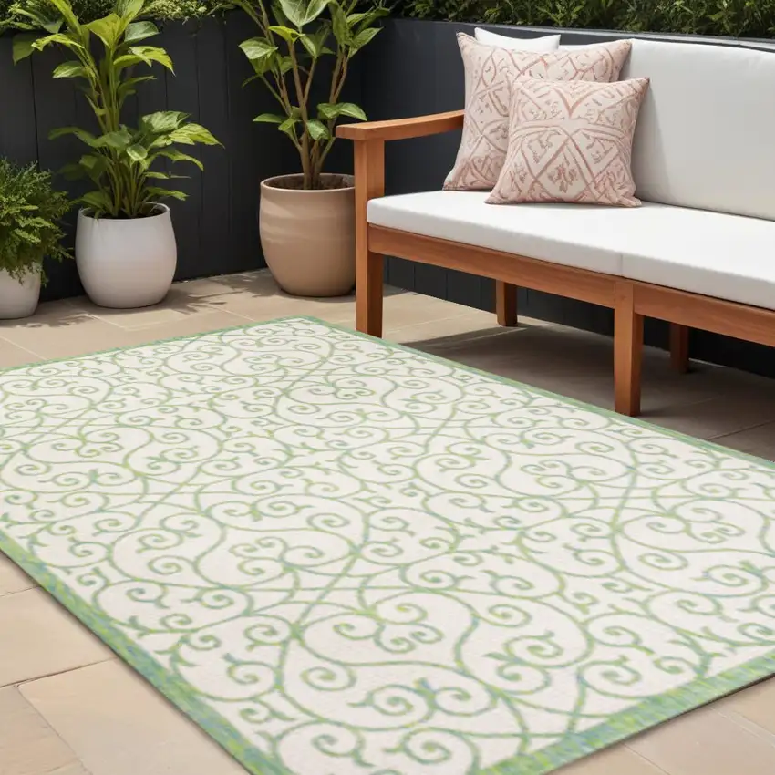 Cream And Green Geometric Indoor Outdoor Area Rug Photo 1