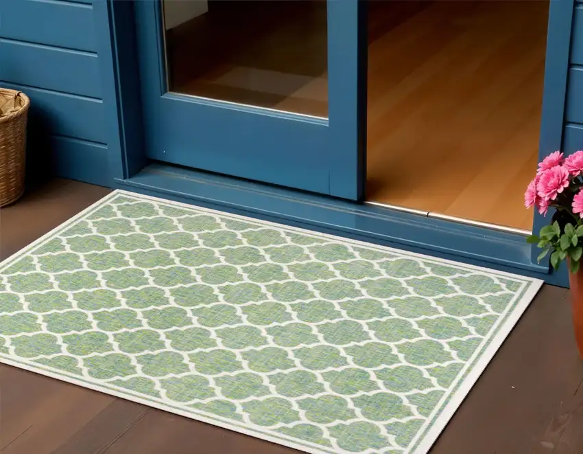 Cream And Green Geometric Indoor Outdoor Area Rug Photo 1