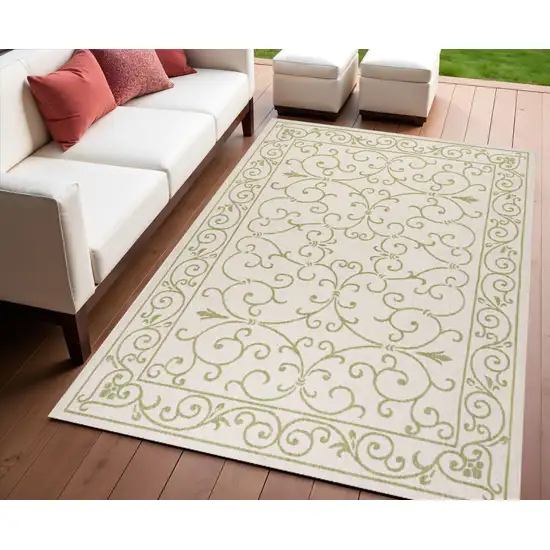 Cream And Green Medallion Indoor Outdoor Area Rug Photo 1