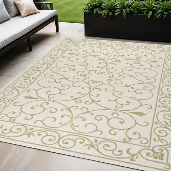 Cream And Green Medallion Indoor Outdoor Area Rug Photo 1