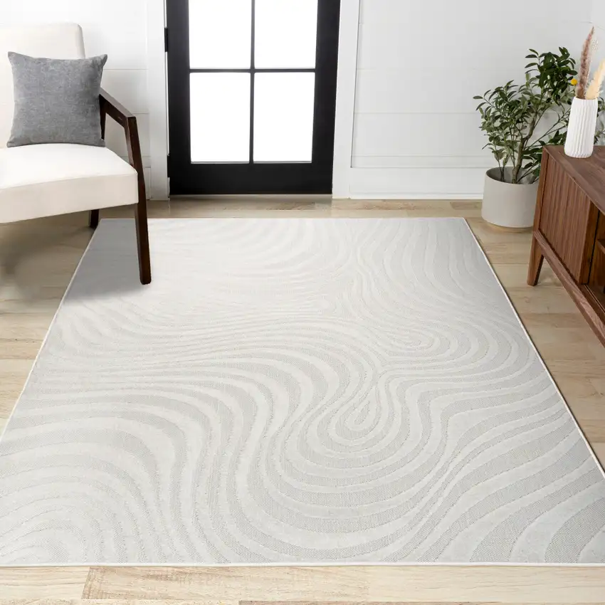 Cream And Ivory Abstract Indoor Outdoor Area Rug Photo 8