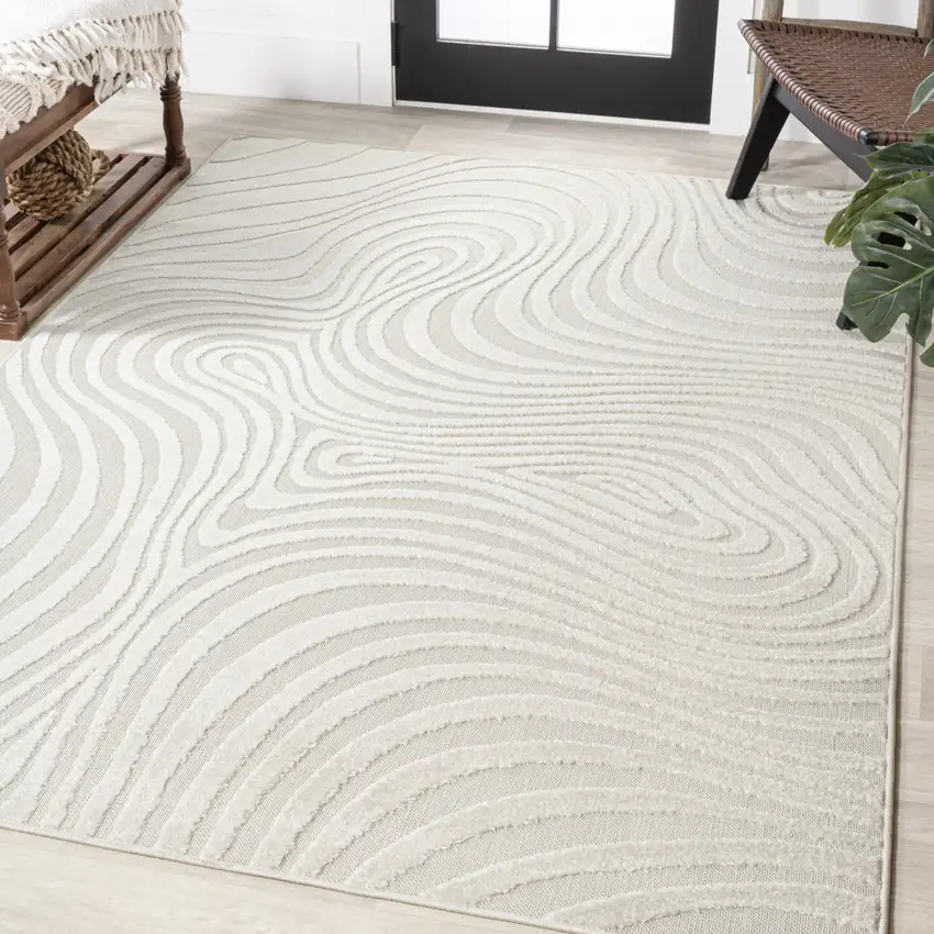Cream And Ivory Abstract Indoor Outdoor Area Rug Photo 6