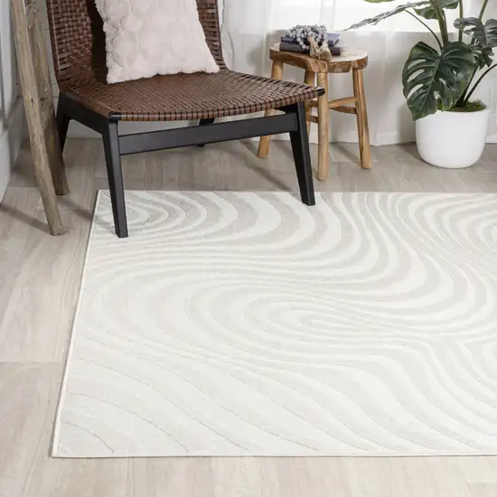 Cream And Ivory Abstract Indoor Outdoor Area Rug Photo 7