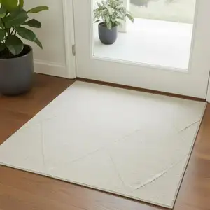 Photo of Cream And Ivory Abstract Square Rug