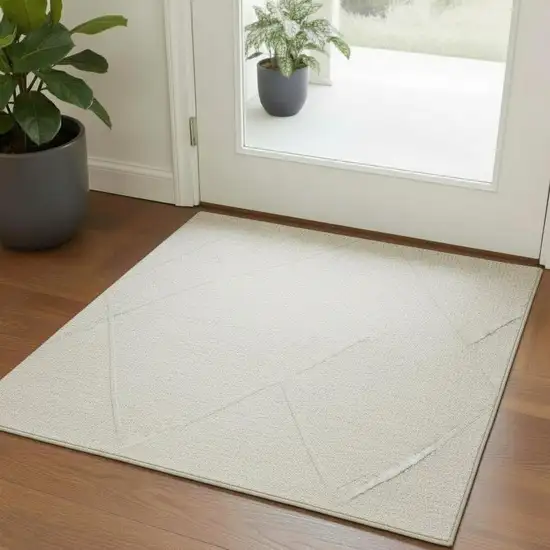 Cream And Ivory Abstract Square Rug Photo 1