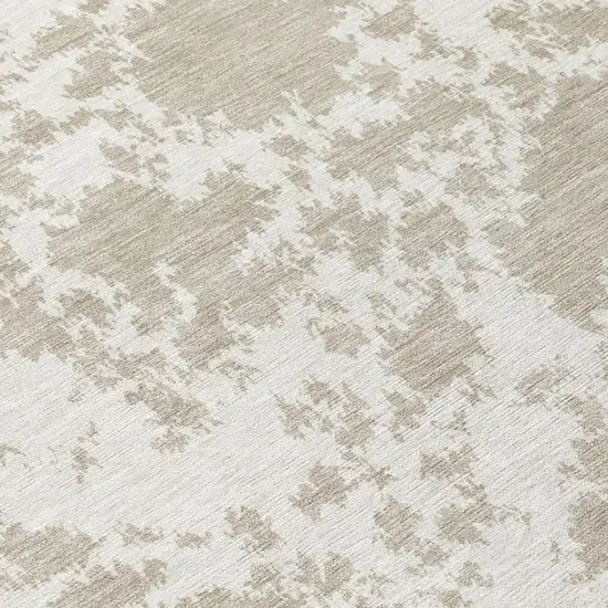Cream And Ivory Abstract Washable Indoor Outdoor Area Rug Photo 5