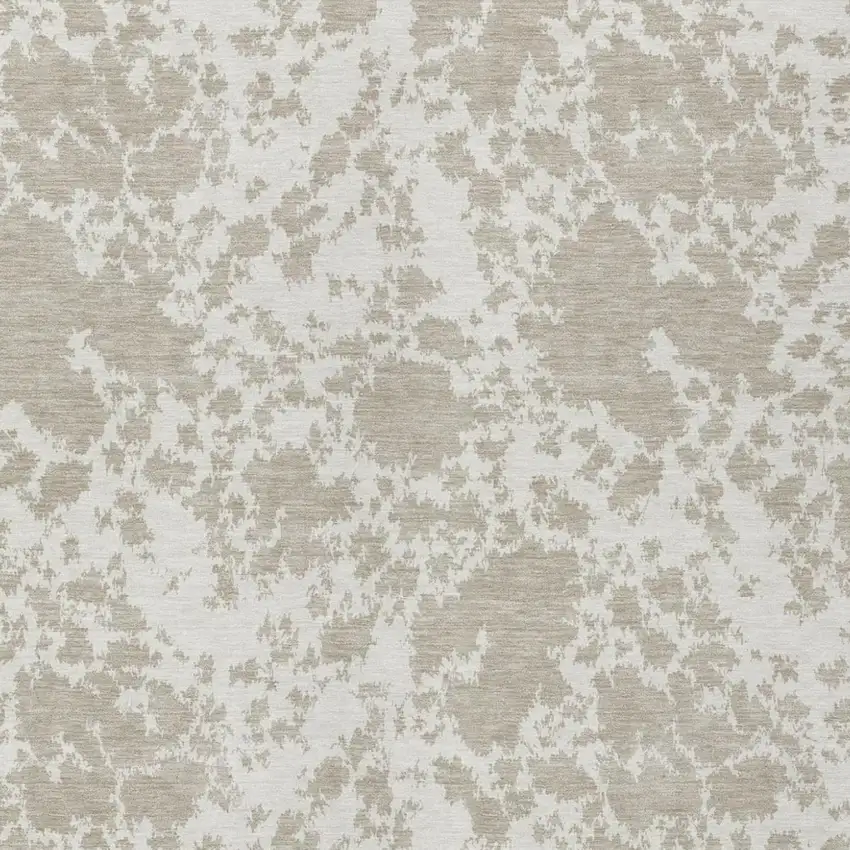 Cream And Ivory Abstract Washable Indoor Outdoor Area Rug Photo 1
