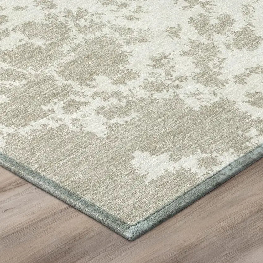 Cream And Ivory Abstract Washable Indoor Outdoor Area Rug Photo 4