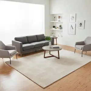 Photo of Cream And Ivory Geometric Area Rug