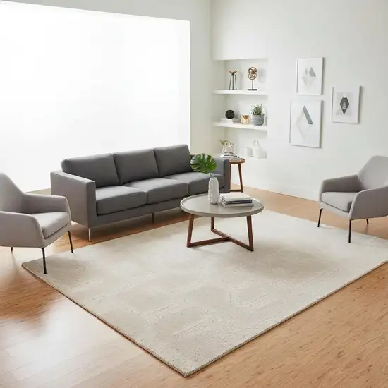 Cream And Ivory Geometric Area Rug Photo 1