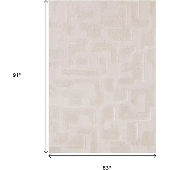 Cream And Ivory Geometric Area Rug Photo 3